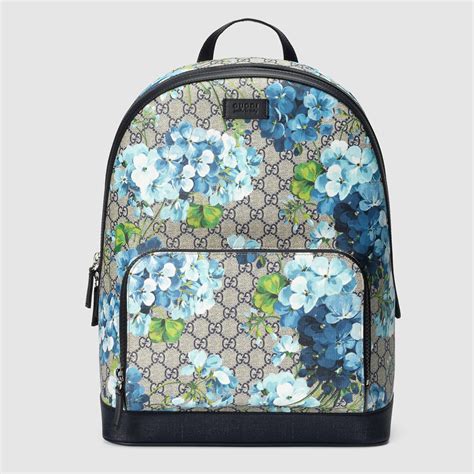 gucci floral print suit|Gucci backpack with blue flowers.